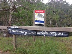 Protest sign and waterhole safety sign at Pound Bend, Warrandyte