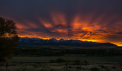 sunrise crepuscular rays clouds mountains montana
