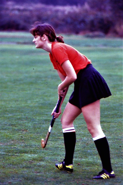 Patti playing field hockey
