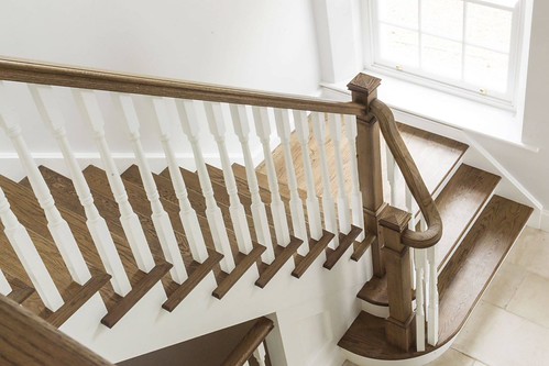 Grand oak staircase with dark oak flooring | by Bath Bespoke