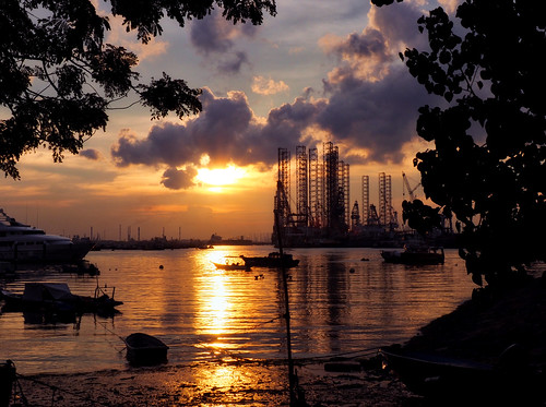 silhouettes clouds goldenlights elenaleong cranes harbour seaside boats