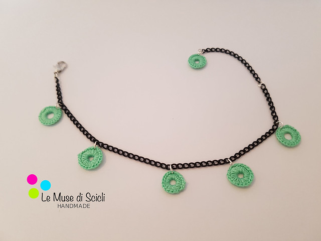 Black bracelet with crochet aquamarine charms