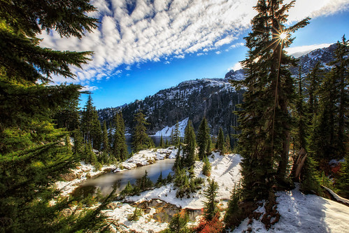 snowlake snowlaketrail tarn sunstar mountains trees htt clouds snow landscape forest hiking alpinelakeswilderness