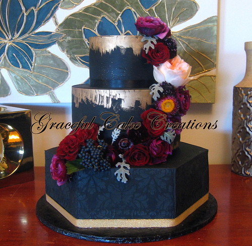 Elegant Black Wedding Cake with Brushed Gold Accents and a… | Flickr
