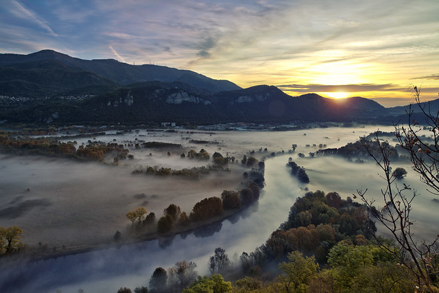 View of the Adda river during a foggy morning, Airuno, Italy