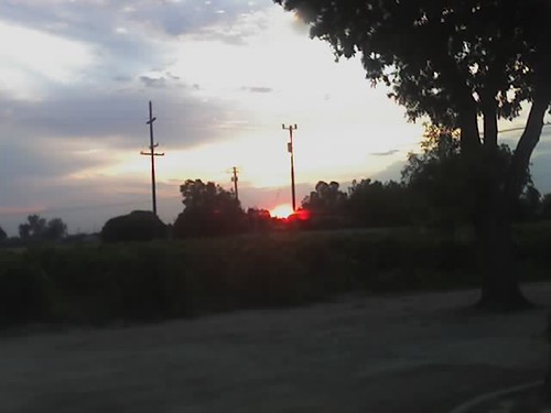Sunset through a window by Weird Fresno, Taken with my Razrcamera phone shots