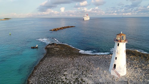 sea water horizonoverwater lighthouse guidance sky cloudsky nauticalvessel cruiseship traveldestinations travel aerialview aerialshot dronephotography bahamas