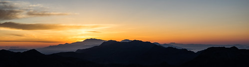dawn sunrise mountains ridges coast crete greece panorama calm serene clouds orange