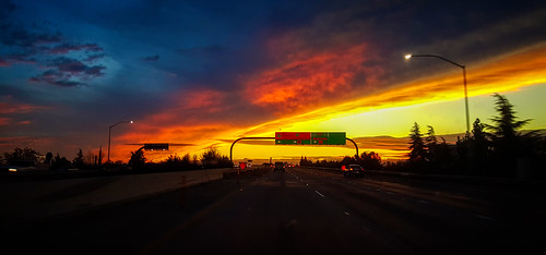 freeway 180 fresno sky sunset davemeyer signs cars road photograbswhiledriving