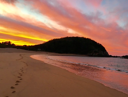 iphonephotos clouds sky footprints beach waves coastline ocean oaxaca huatulco mexico sunrise
