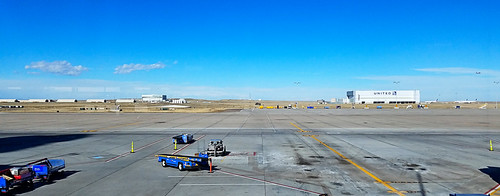 stapletonairport denver colorado photo digital autumn fall airport tarmac runway baggageloader hangars landscape
