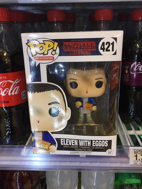 This Funko POP Stranger Things Eleven is chilling with her Eggos.