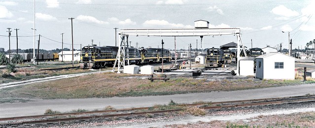 Seaboard Coast Line diesel electric locomotives are seen in the maintenance and shop area of the old railroad yard in Lakeland, Florida, 1974