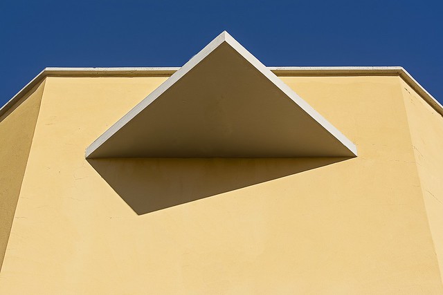 Yellow wall and triangle