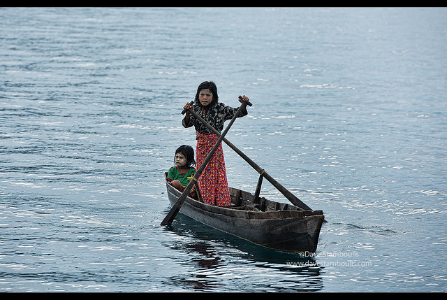 Moken girl rowing in the Mergui Archipelago, Myanmar