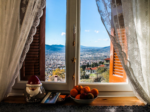 volos anakasia pelion greece view window kitchen table frame landscape curtains shades sun shadow