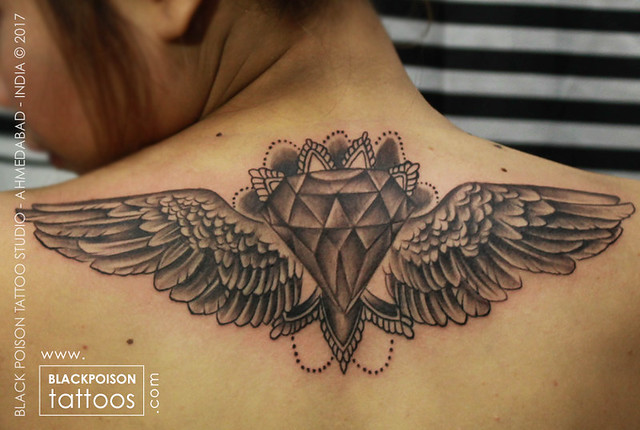 Diamond wings tattoo