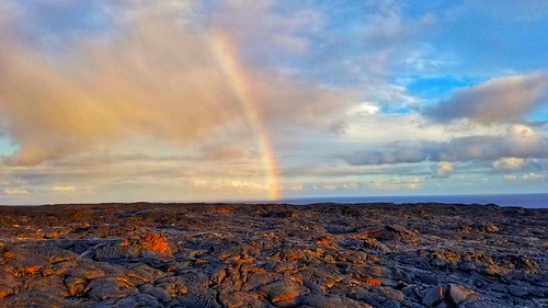 hawaii lava field rainbow sunset