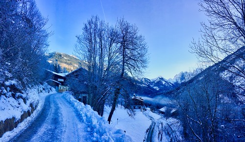 winter snow ice frost cold alps austria tyrol tirol europe europa road street trees mountains sky blue morning iphone