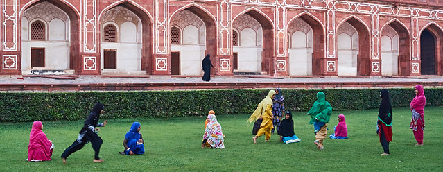 Indian girls playing in  Humayun's tomb garden, New Delhi, India