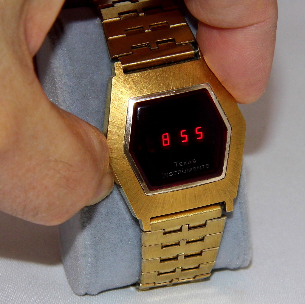 Vintage Texas Instruments Digital Quartz Watch, Model TI-404, Gold Tone Case & Band, Five Time Functions Controlled By A Single Command Button, Red LED Display, Made In USA, Circa 1977