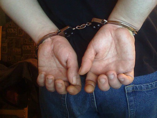 handcuffed arested