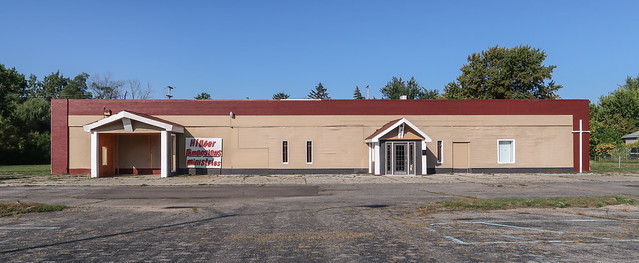 At Higher Dimensions Ministries. Big parking lot for long church with 2 entryways.