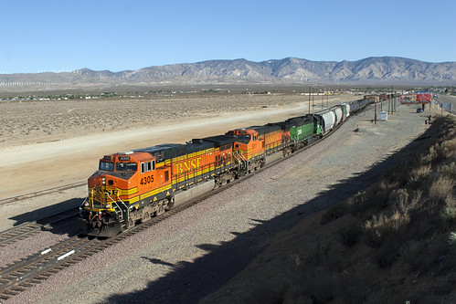 MOJAVE. by Chris G Perkins, BNSF 4305, BNSF 5211 (both C44-9W's) & FURX 7209 (SD40-2) take the Barstow route at the south en