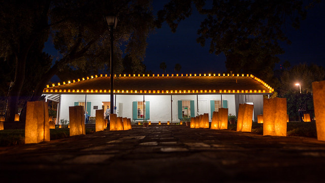 Fiesta de las Luminarias Casa Adobe de San Rafael surrounded in candlelight.