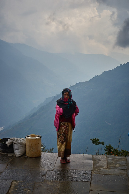 Nepali woman over the valley, Ghandruk area, Annapurna massif, Nepali