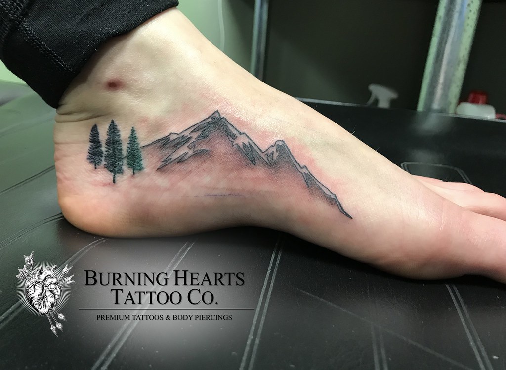 Mountains tattoo on a foot by Conz Thomas  Tattoogridnet