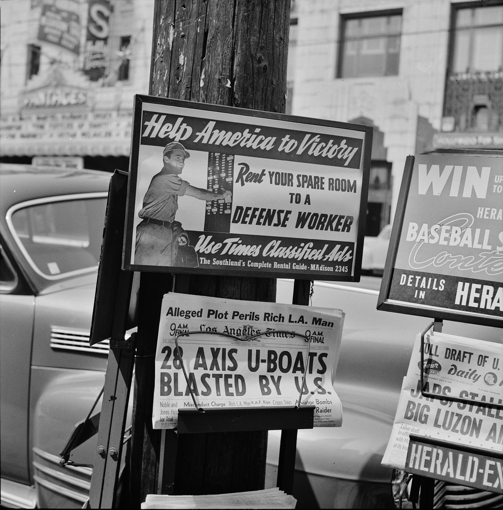 Word on the Street: Newsstand on a street corner in Los Angeles, California. April 1942.