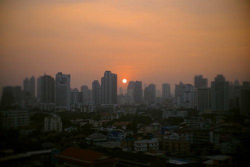 sun bangkok sunset thailand buildings city urban skyline cityscape orange outdoors