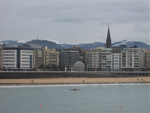Playa de la Concha, with snow-capped mountains behind
