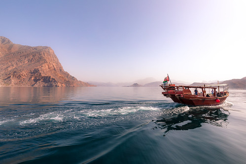 musandamgovernorate oman om beauty beautiful people fisher fishing dhaw fish snorkelling beach rock rocks mountains musandam blue red yellow sun sky water sea dolphin dolphins cruise