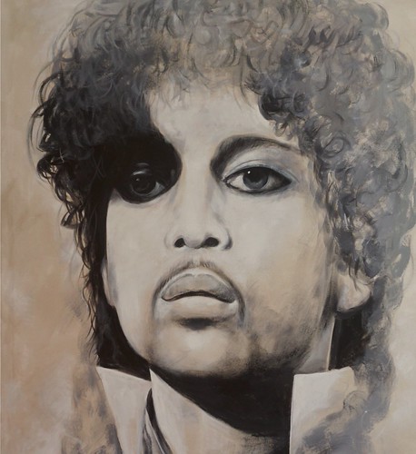 Black and white portrait with curly hair and dark eyes