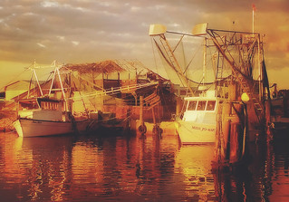 Shrimp boats at sunset in Bayou La Batre Alabama