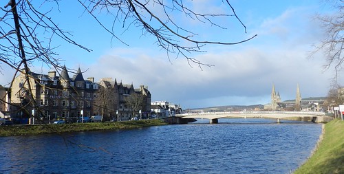 river ness inverness captial highlnads scotland weather blue sky water trees hotel banks steeple church bridge allanmaciver