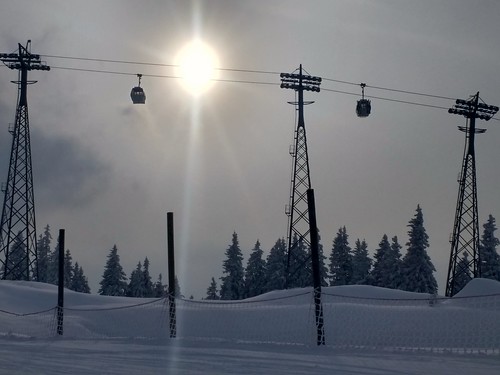 snowboards snowboard snow gondola kitzbuhel silhouette sunset longshadows