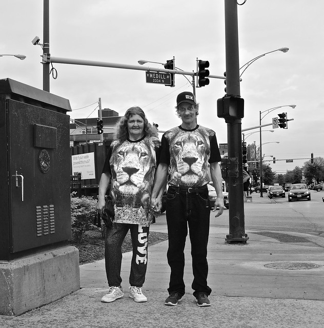 Couple wearing shirts with the same design - Chicago, IL