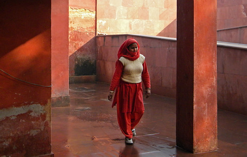 Woman in red in the Red Fort in Delhi, India