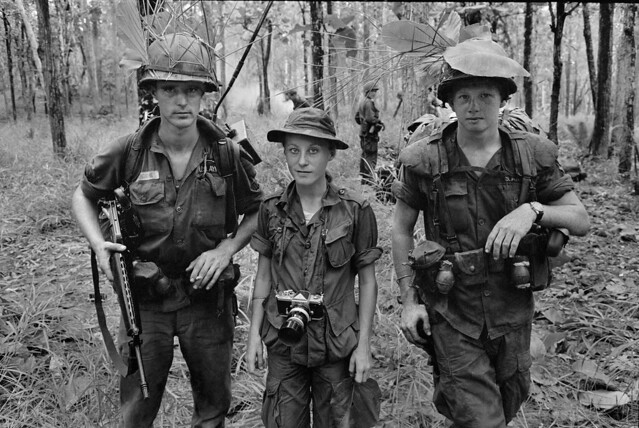 1966/68 - Catherine Leroy during the Vietnam war. The photo shows her with US soldiers from 1st Infantry Division in jungle. Photo Credit Catherine Leroy