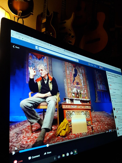 Dr. Robert Thurman gives the perfection / teaching mudra while making a presentation at Menla, during love your enemies retreat, Internet, laptop, music room, Olympia, Washington, USA