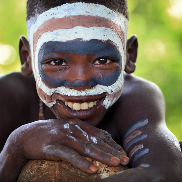 Suri boy with painted face in Bargoba village.,dietmartemps photography,
