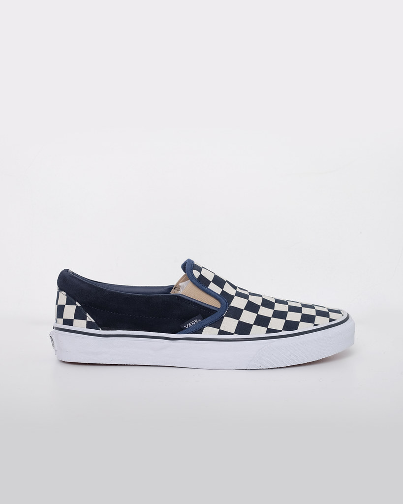 vans checkerboard slip on navy