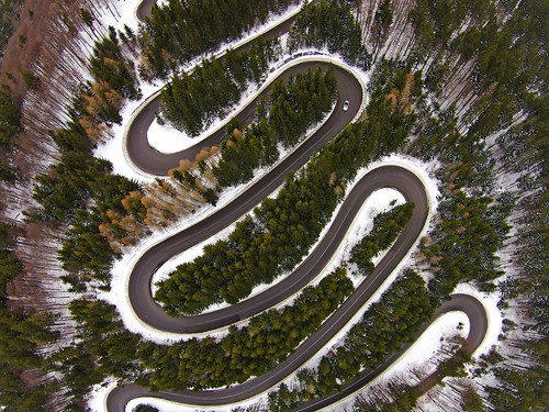 aerial altitude asphalt auto bend car carpathians curve curves dangerous destination drive fir forest landscape lorry mountains nature nobody outdoors pass path road romania scenery scenic snow snowing spectacular traffic transportation travel tree trip truck turns valley vehicles way winter
