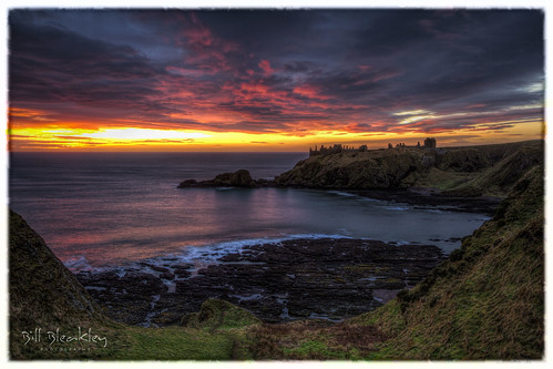 dunnottar castle aberdeenshire scotland sunrise shore coast beach
