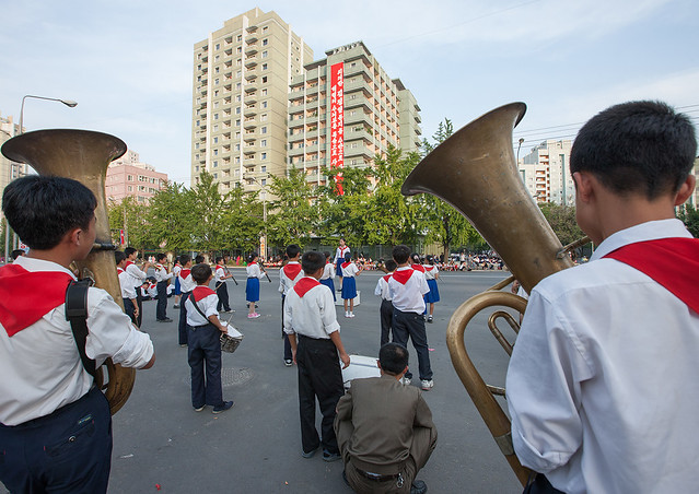 North Korean pioneers playing music during the celebration of the 60th anniversary of the regim, Pyongan Province, Pyongyang, North Korea
