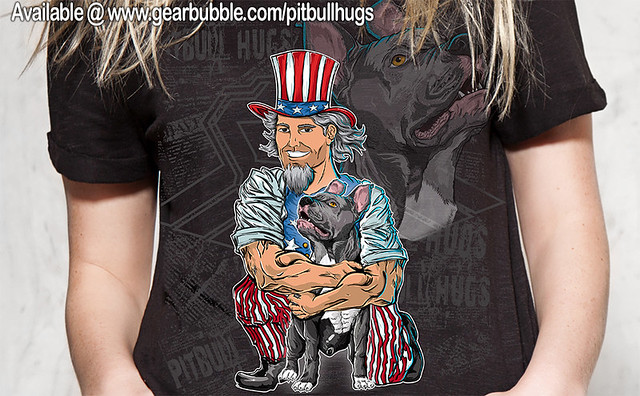 Uncle Sam hugging a cute blue pit bull puppy dog