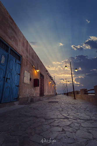 doha qatar al wakra wakrah souq waqif wakif sunrise sun clouds sunrays rays colors ocean bazaar market photography architecture canon camera 6d 1740mm landscape cityscape